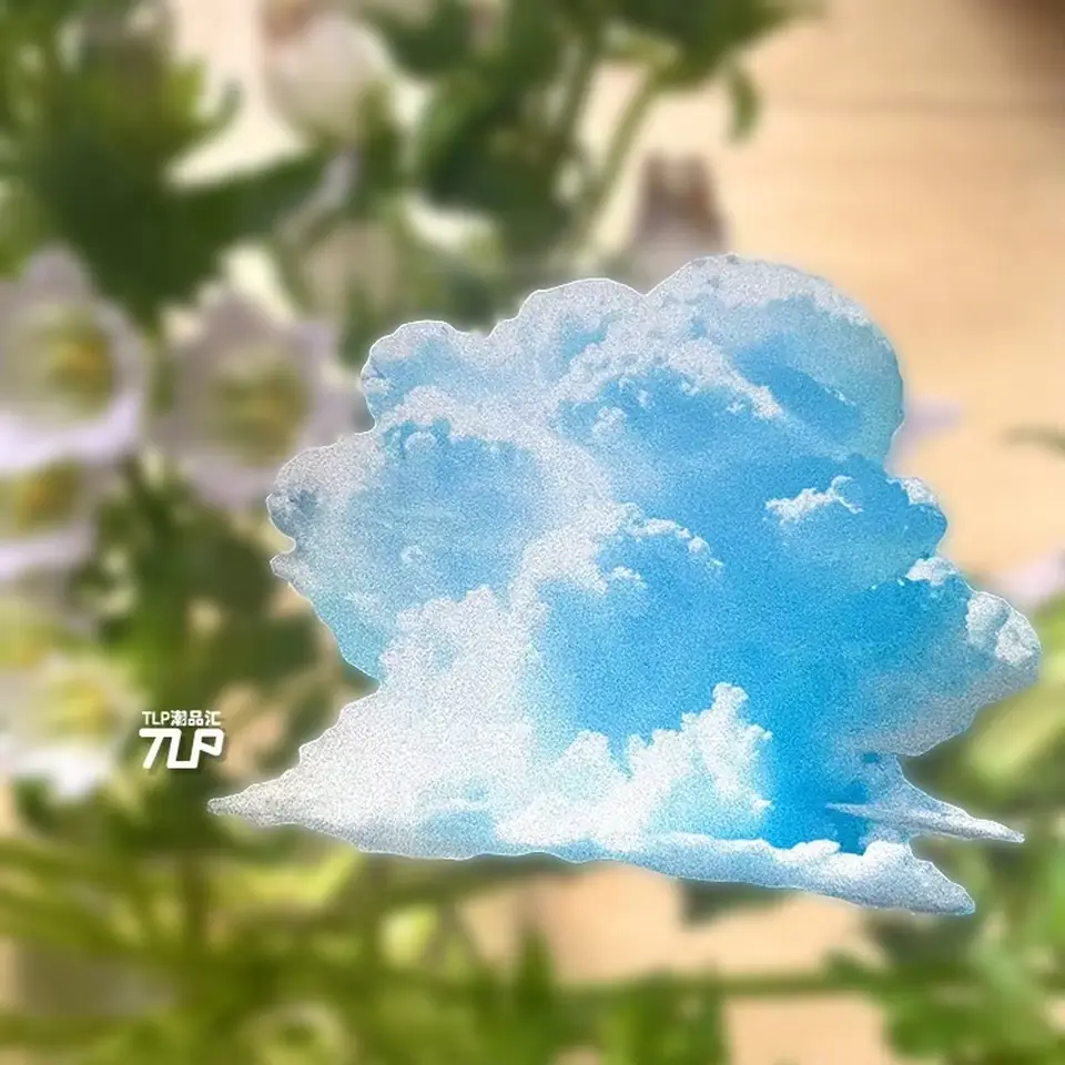 blue-sky cloud sticker against flowers