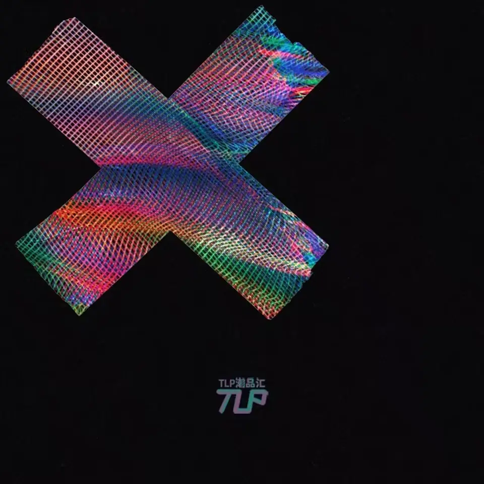 iridescent mesh X-shaped sticker on black